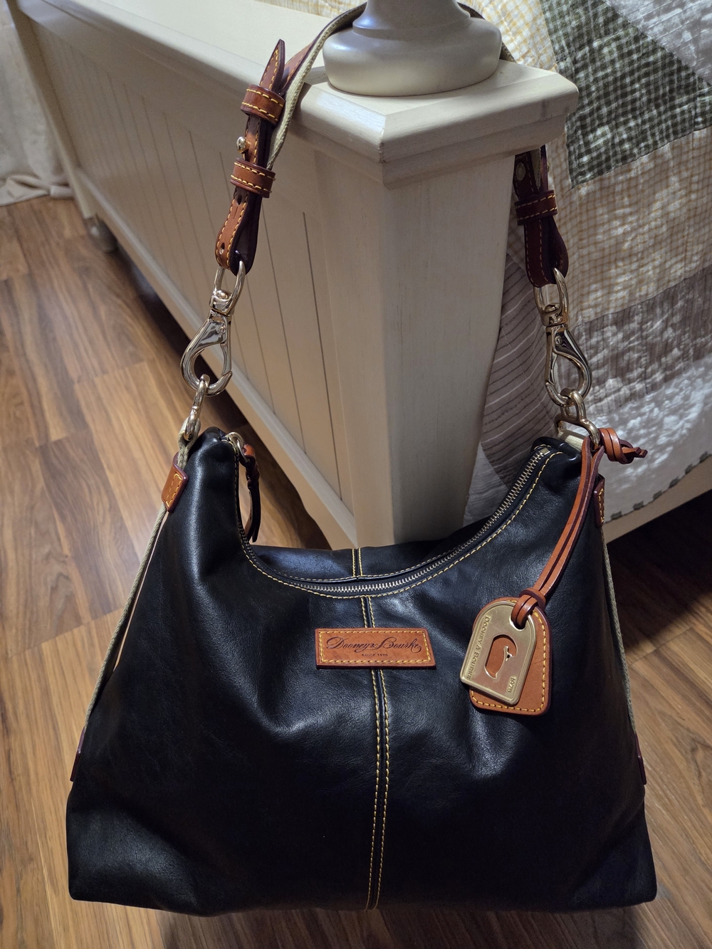 Dooney & Bourke Black Leather Hobo Bag with Brown Trim